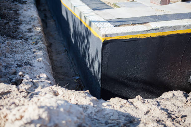 Professional Waterproofing technician working in Castleton, VA